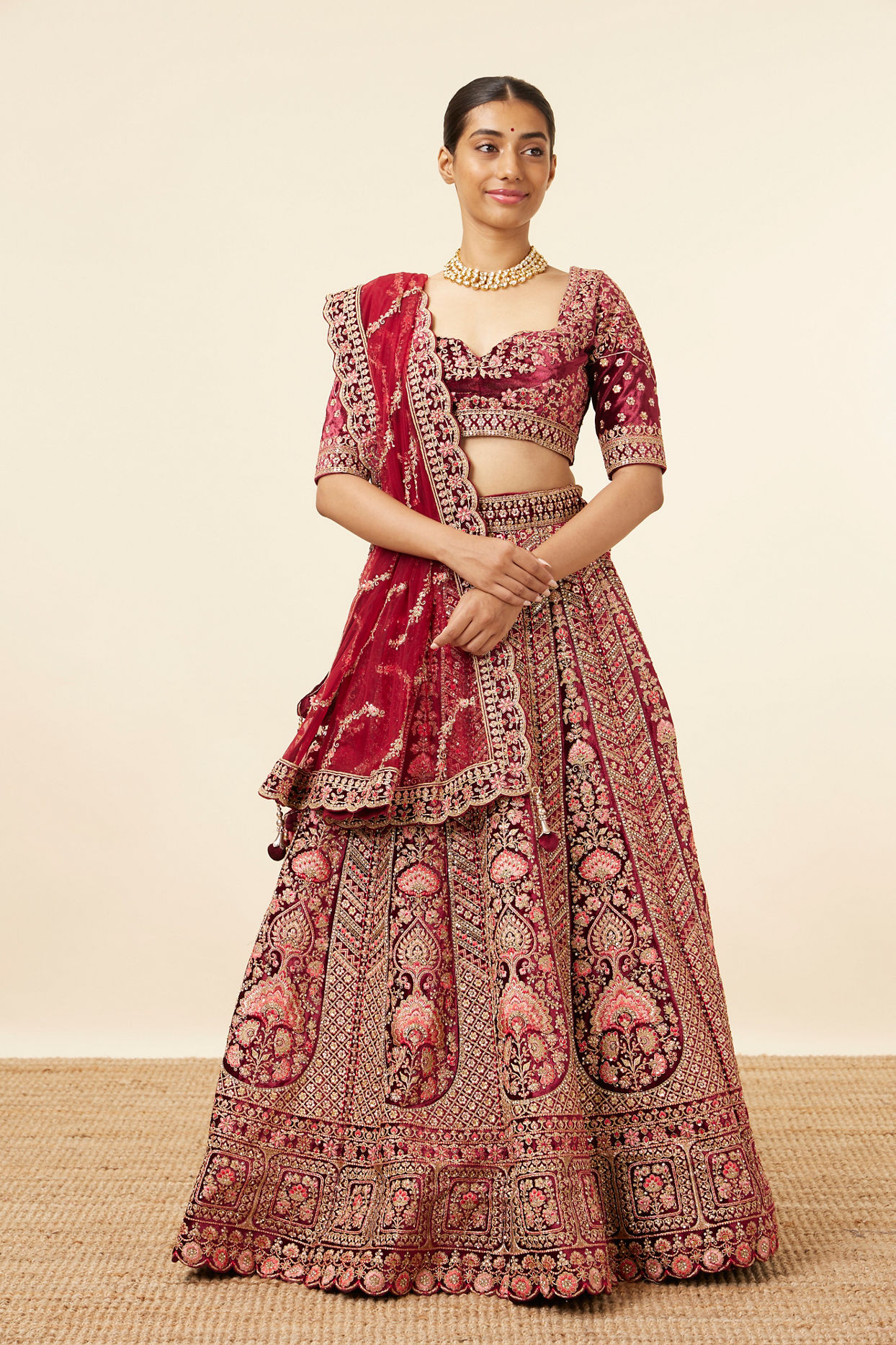 alt message - Mohey Women Maroon Embellished Bridal Lehenga image number 0